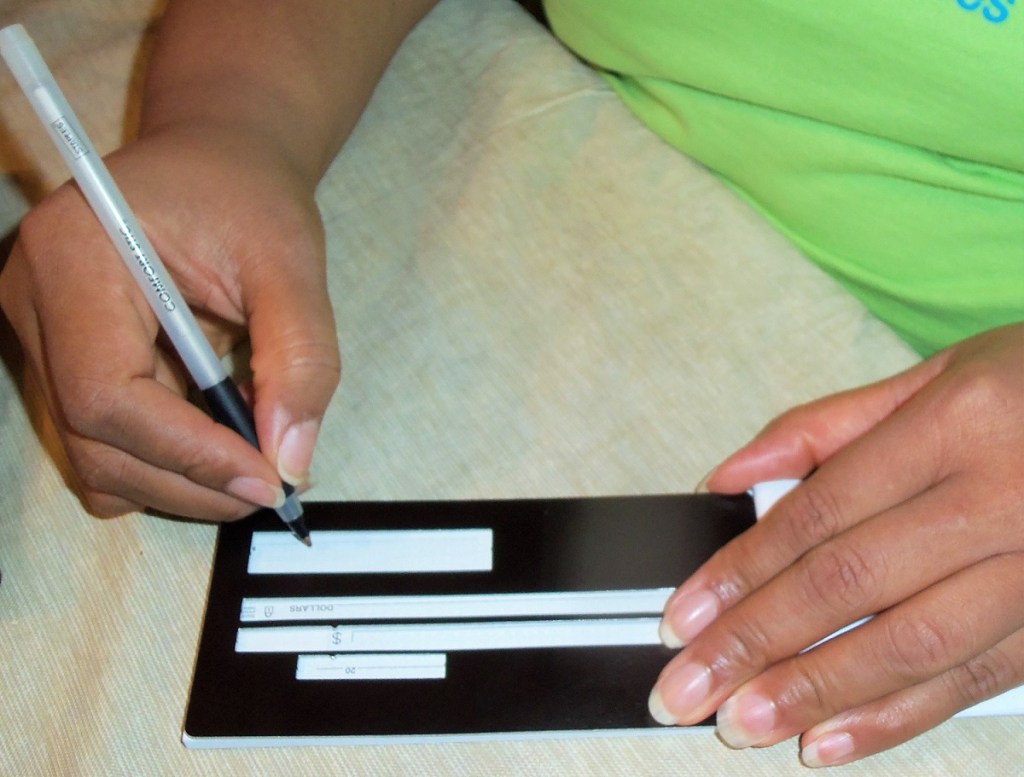 Empish Writing a Check