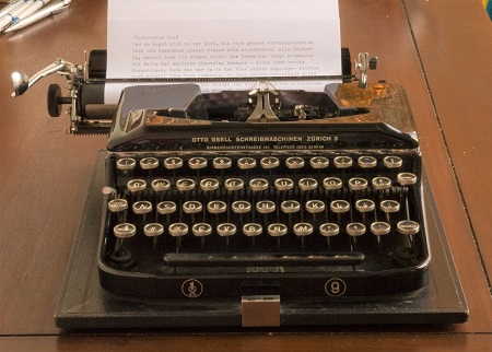Vintage typewriter on a wooden desk